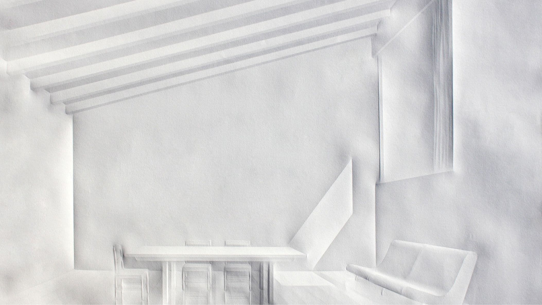 Daylight raking across a sculptural concrete interior